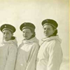 Nine military women in white parkas. click here for full image